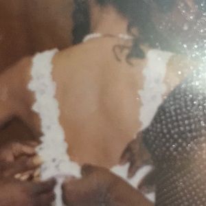 White elegant wedding gown size 4 with wide lace straps revealing half your back